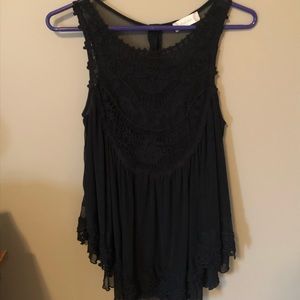 black sheer tank from Alrer’d State